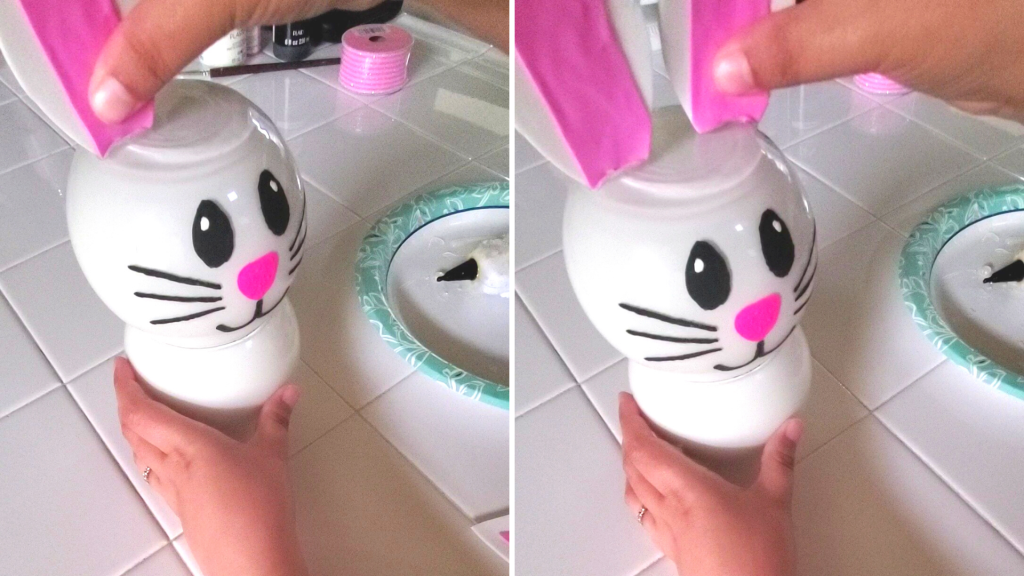 painting a line with the black paint underneath the nose and create two curved lips stemming from that line
With hot glue, attach the ears to the top of the jars. 